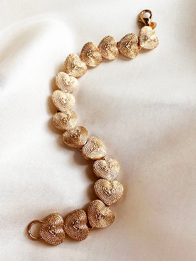 Gouden hartjes schakelarmband