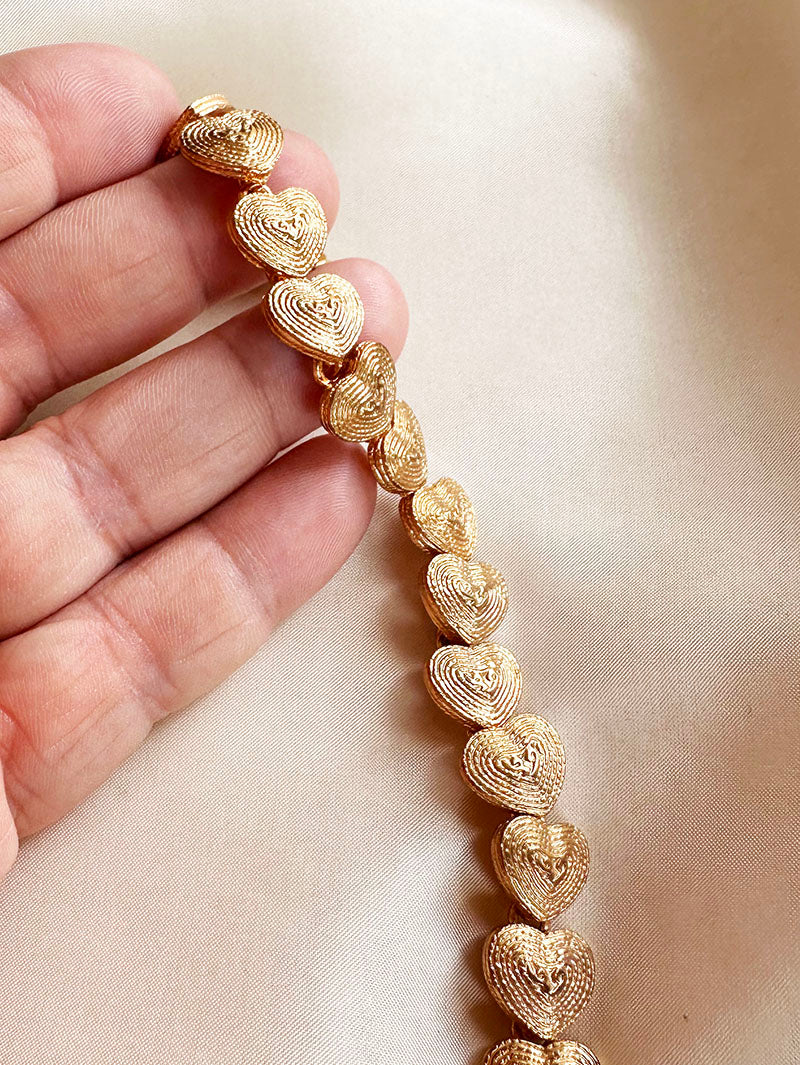 Gouden hartjes schakelarmband