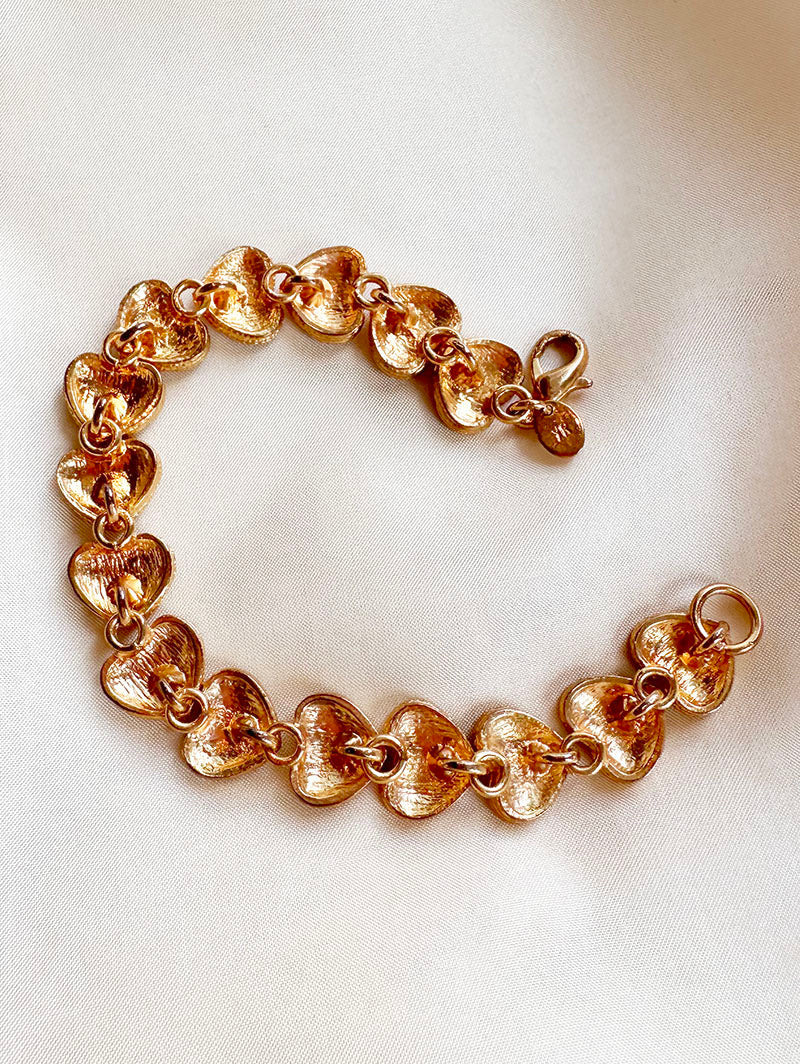 Gouden hartjes schakelarmband