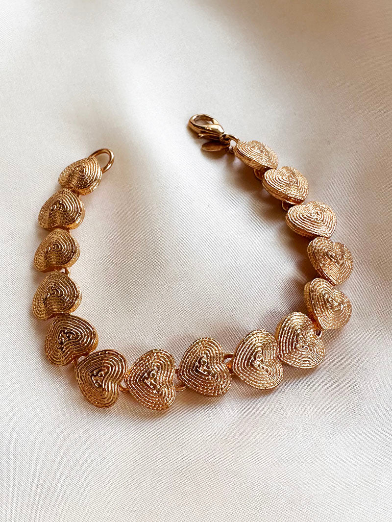 Gouden hartjes schakelarmband