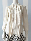 Off-white zijden strikblouse