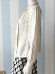 Off-white zijden strikblouse