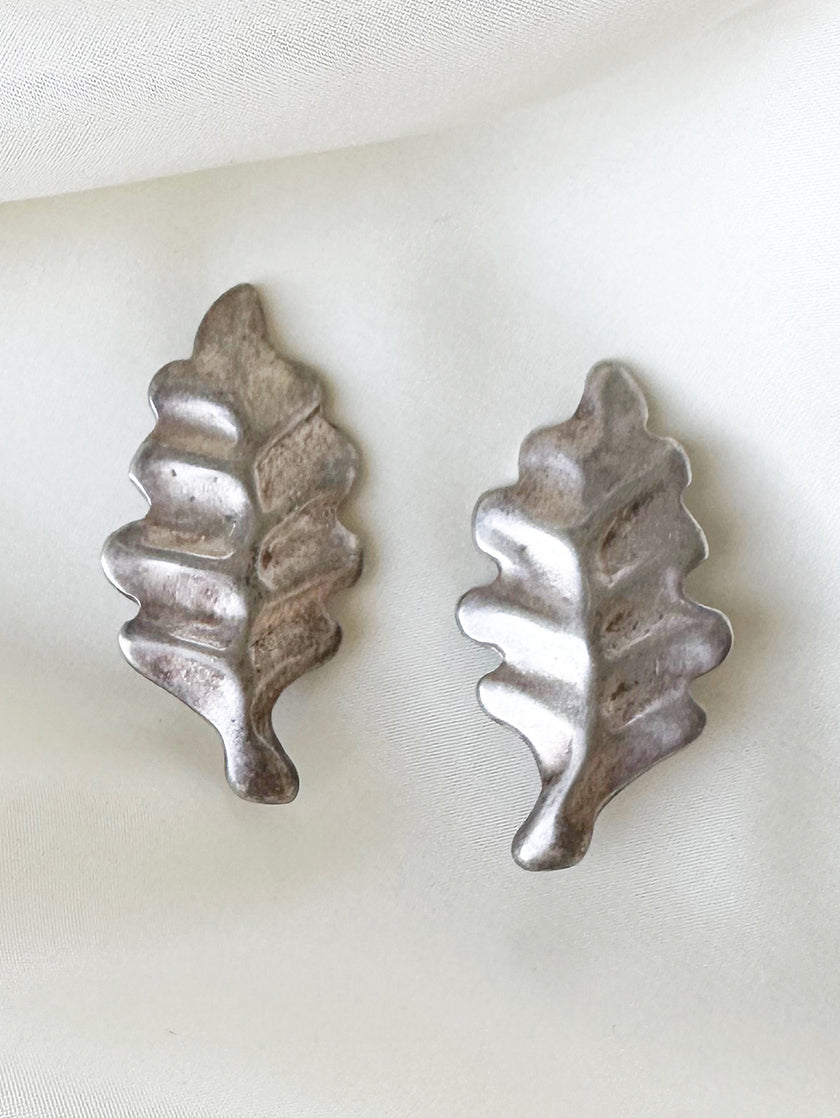 Zilveren blaadjes clip oorbellen