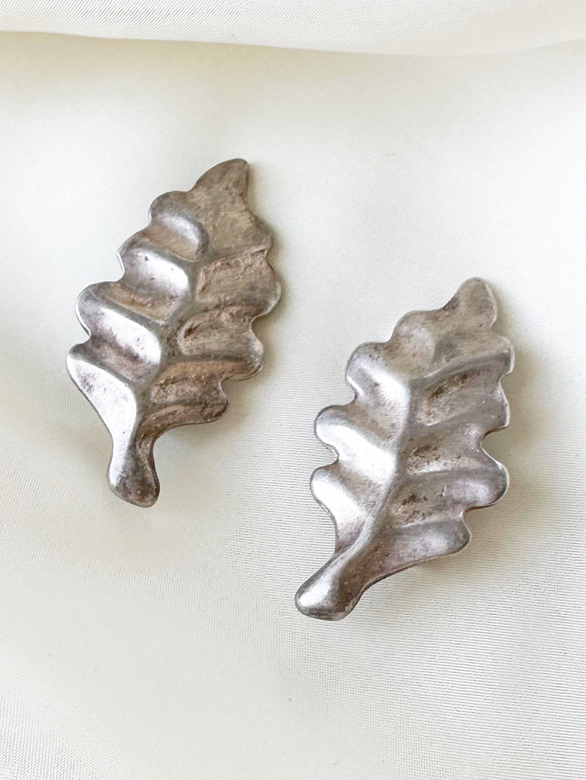 Zilveren blaadjes clip oorbellen