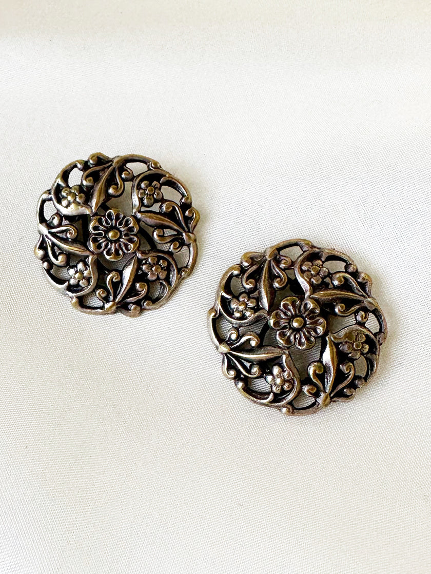 Zilveren floral clip oorbellen