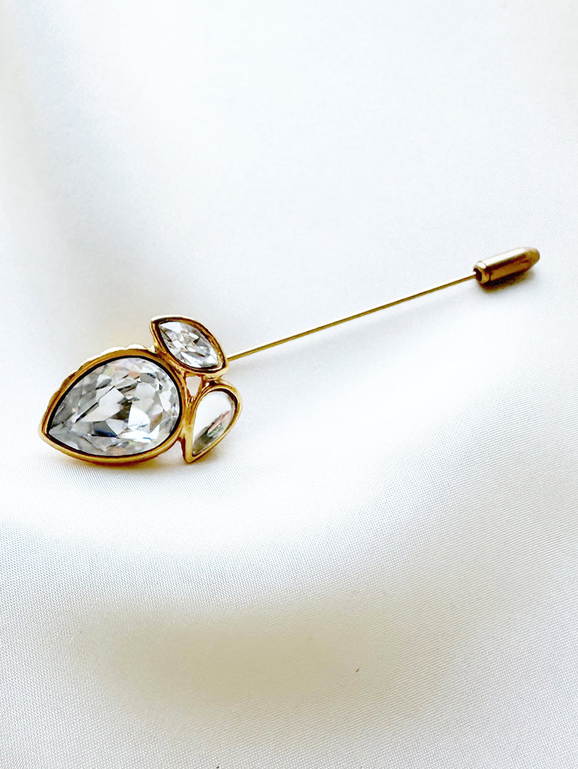 Vergulde designer dasspeld