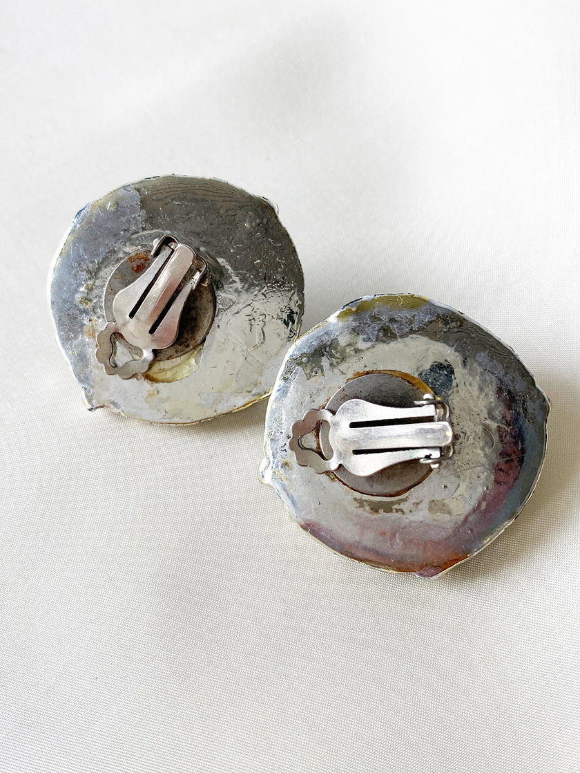 Grote ronde zilveren clip oorbellen