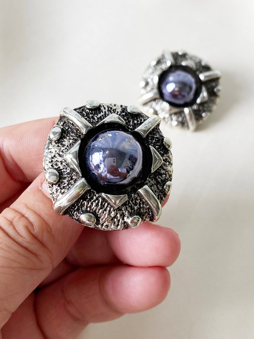 Grote ronde zilveren clip oorbellen