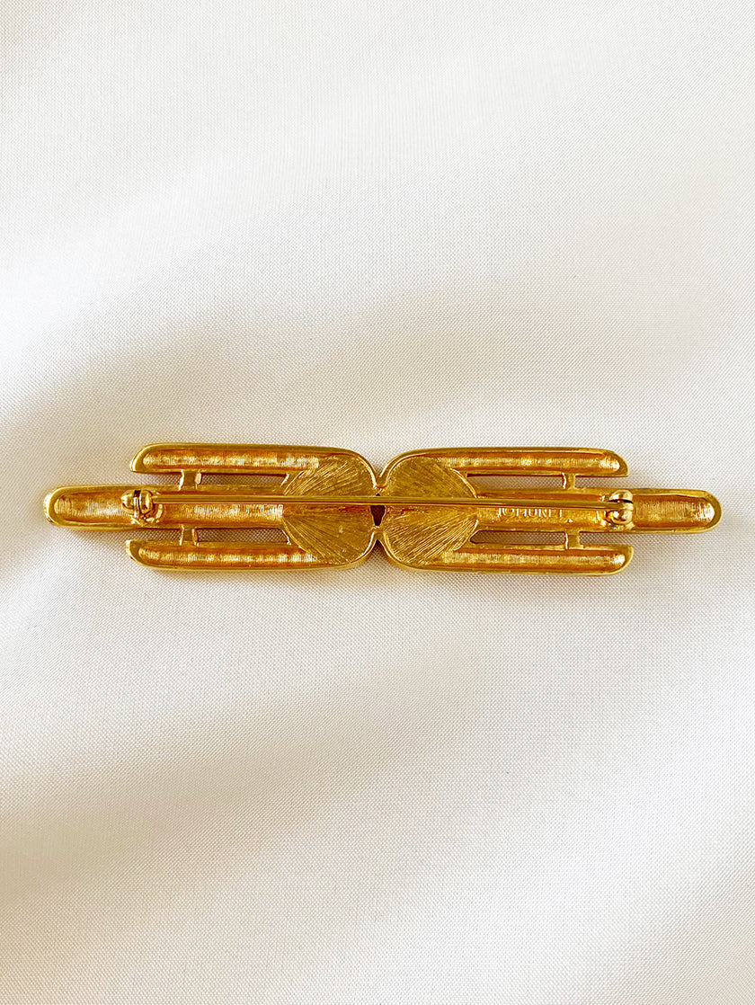 Vergulde designer broche