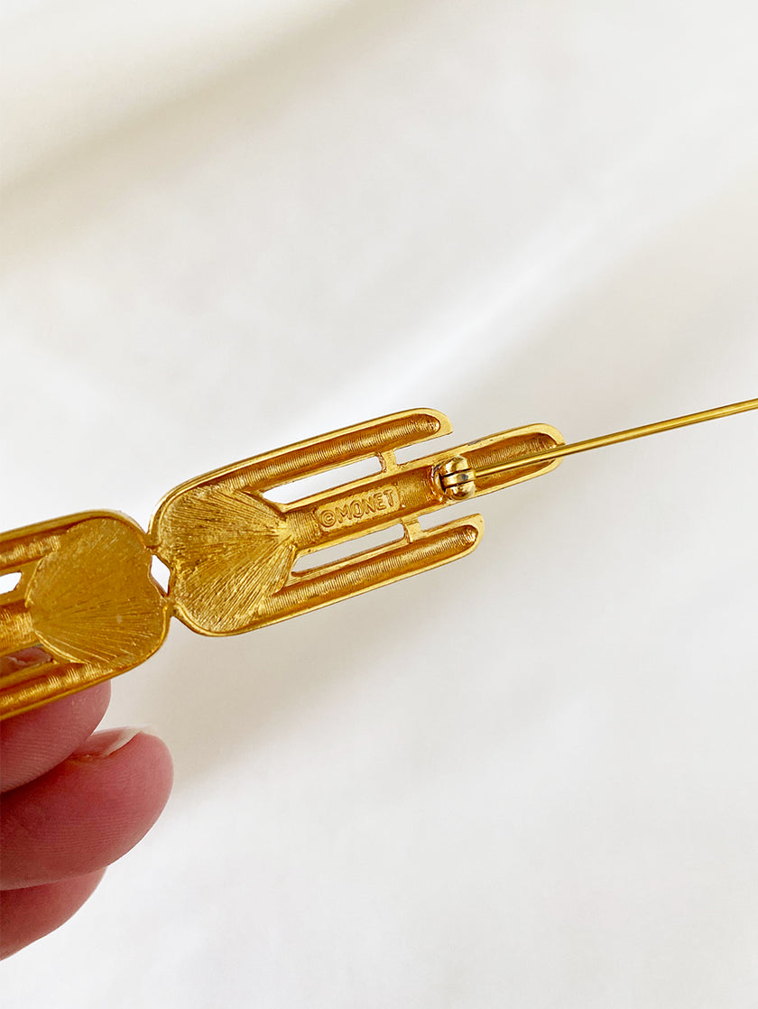 Vergulde designer broche