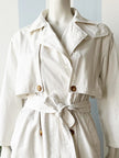 Witte katoenen trenchcoat