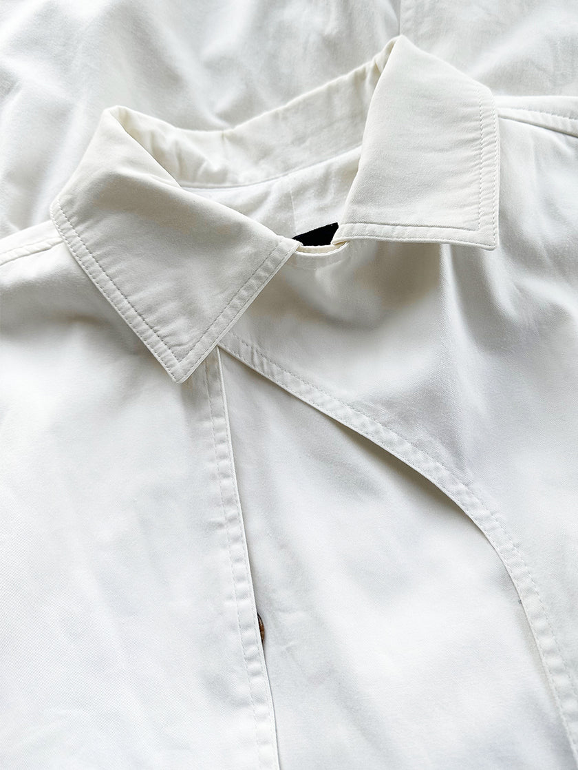 Witte katoenen trenchcoat