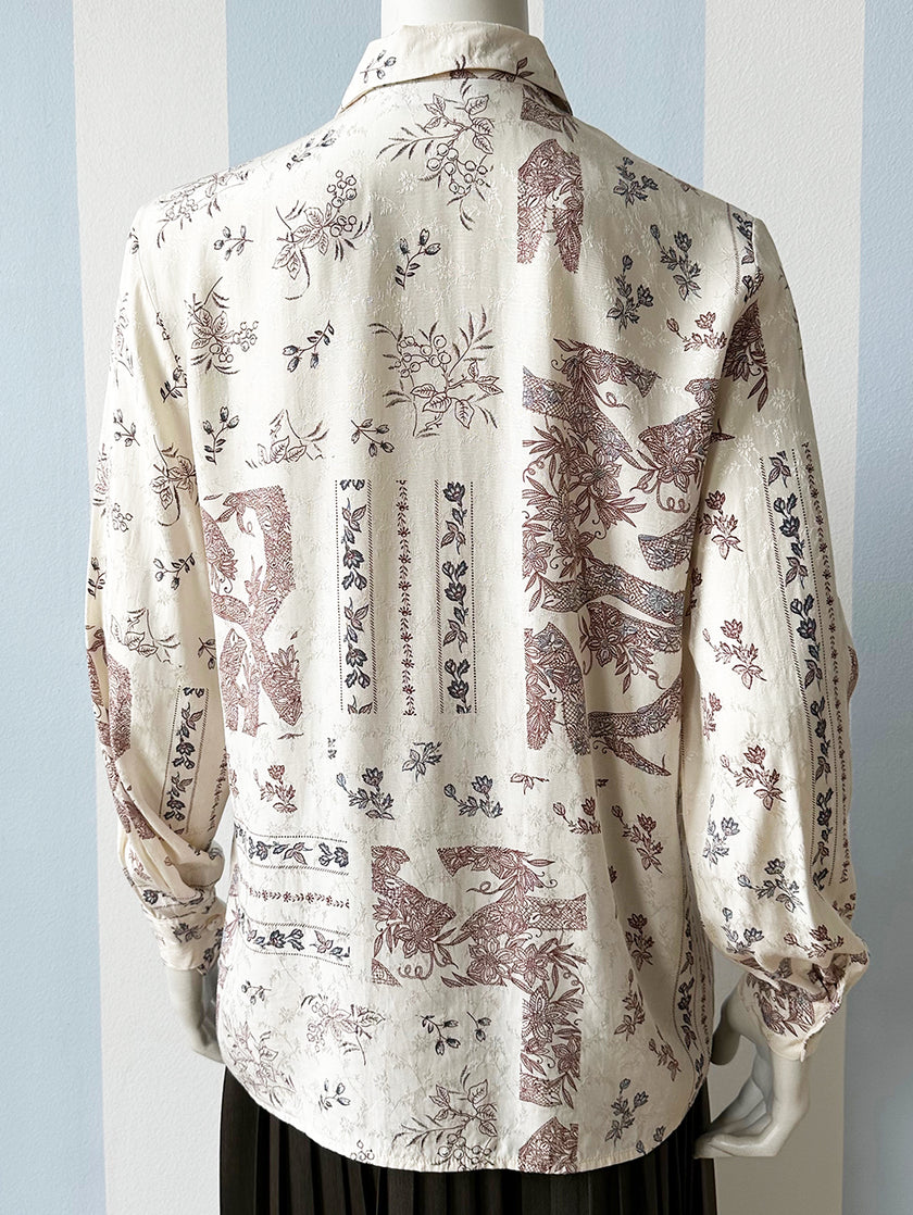 Off-white floral blouse