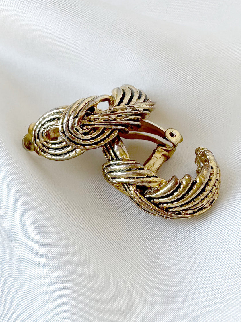 Gouden pluim clip oorbellen