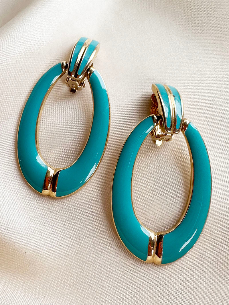 Gesigneerde turquoise clip oorbellen