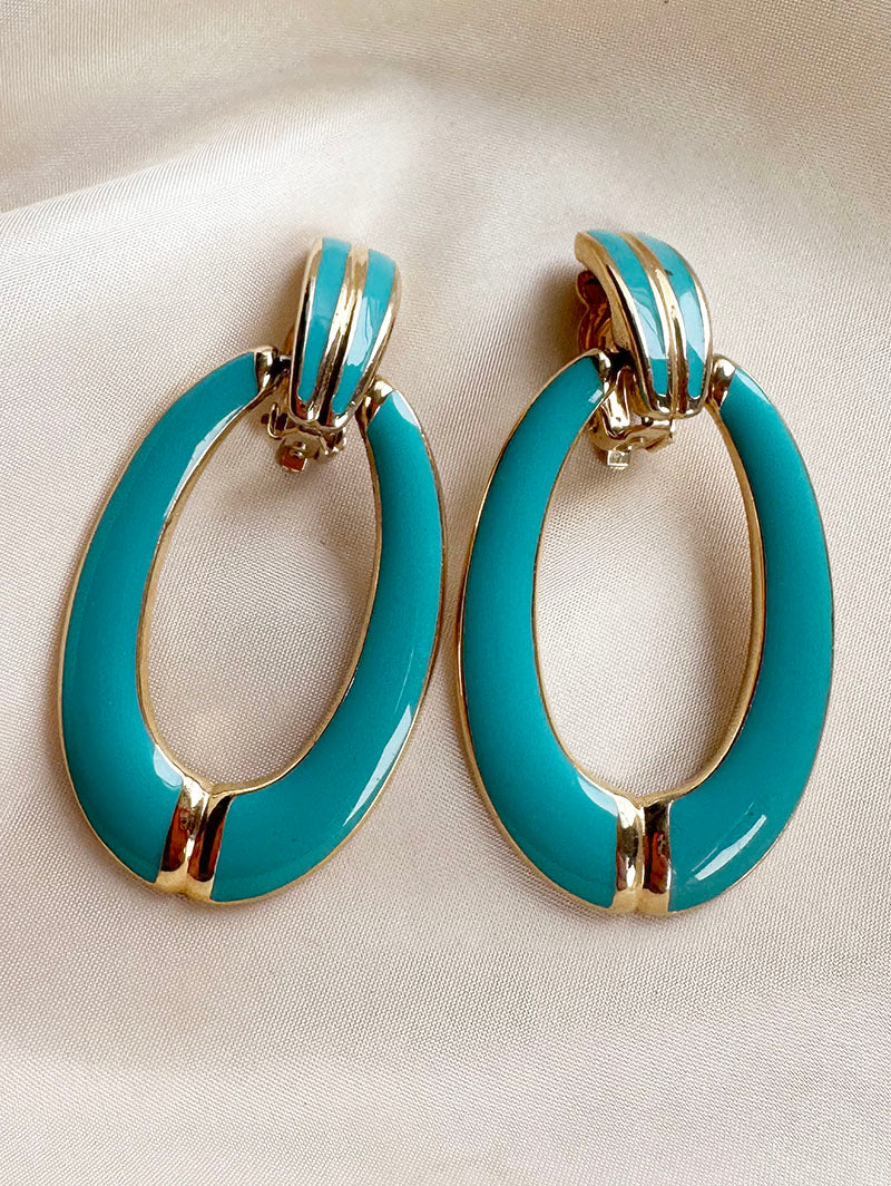 Gesigneerde turquoise clip oorbellen