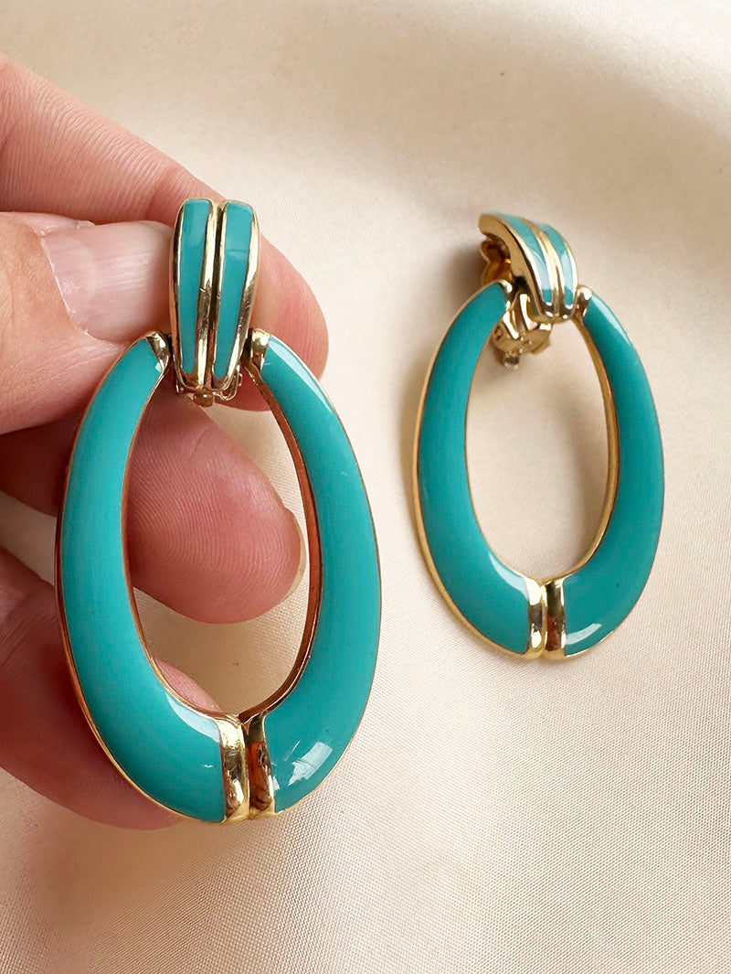 Gesigneerde turquoise clip oorbellen