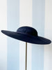 Donkerblauw hoedje met brede rand