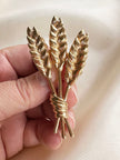Vergulde koren broche