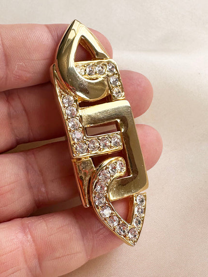 Vergulde broche met strass