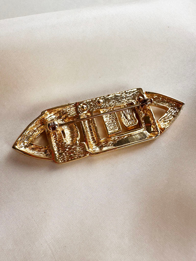 Vergulde broche met strass
