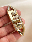 Vergulde broche met strass