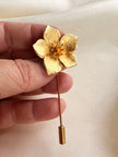 Vergulde bloem reversspeld