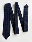 Donkerblauwe smalle designer stropdas