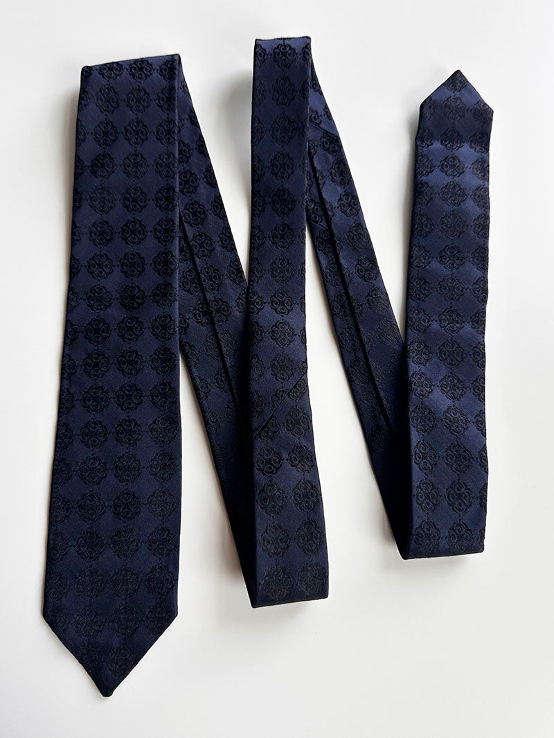 Donkerblauwe smalle designer stropdas