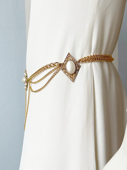 Gouden ceintuur met faux parels