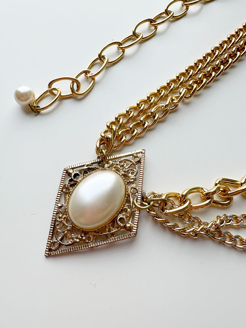 Gouden ceintuur met faux parels