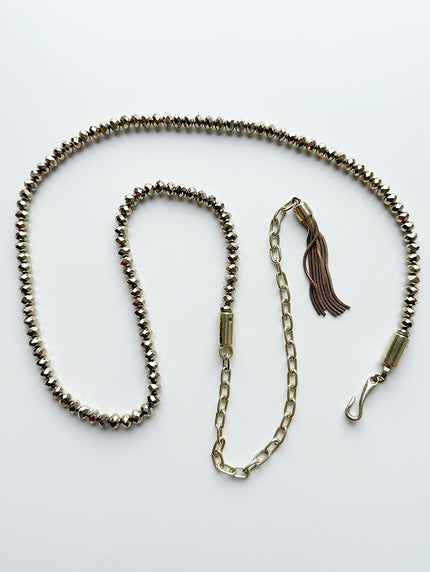 Gouden ceintuur van kralen