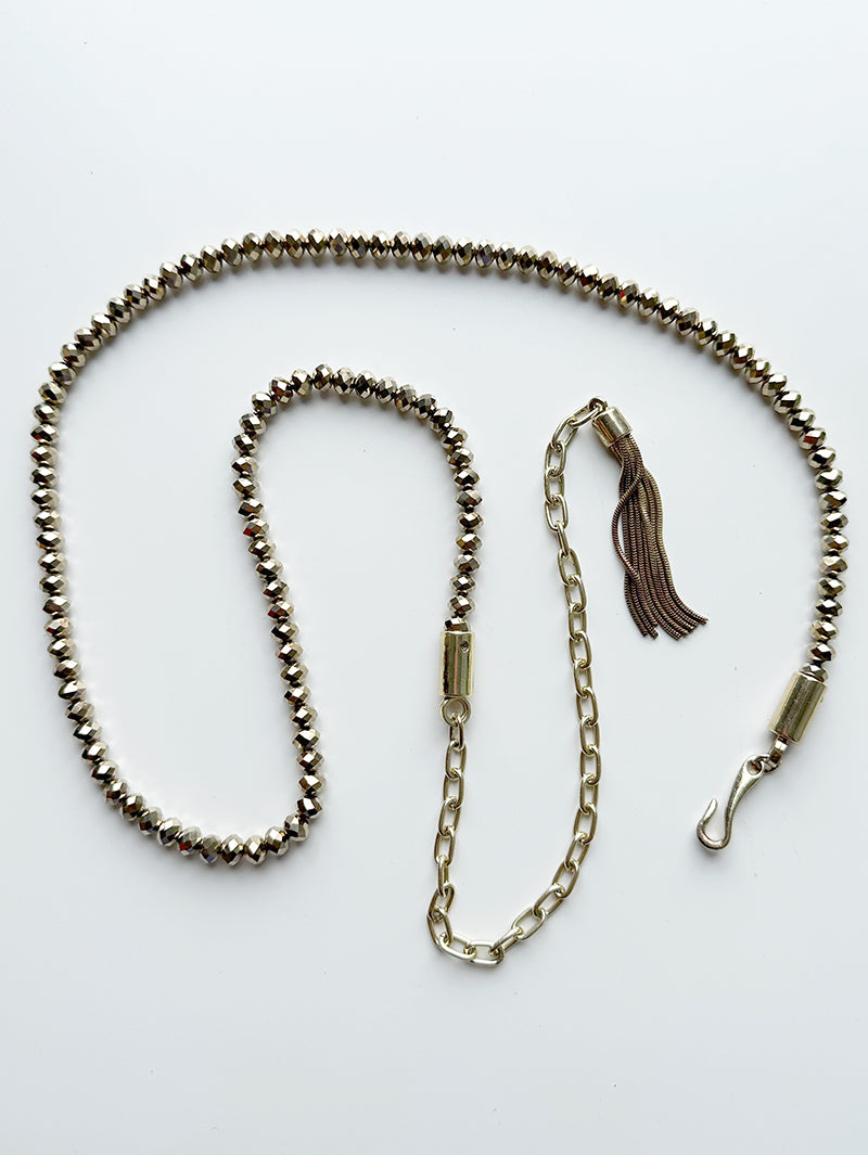 Gouden ceintuur van kralen