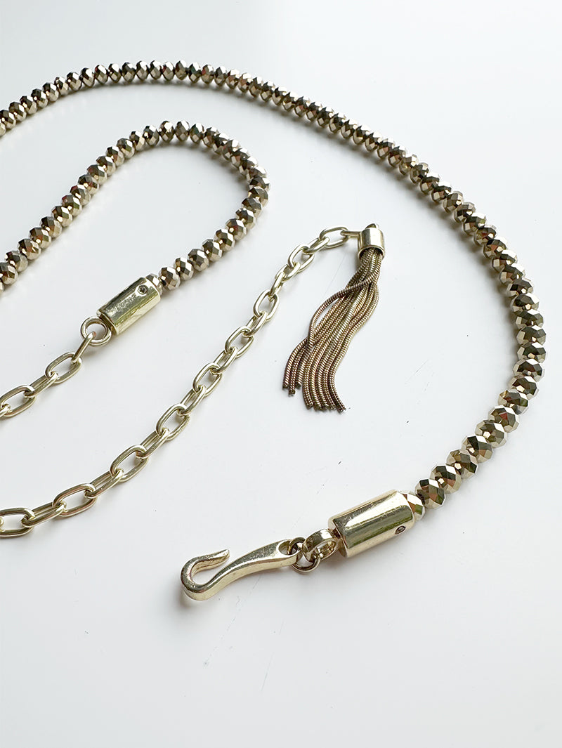 Gouden ceintuur van kralen