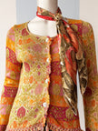 Gebreid floral vestje met franjes