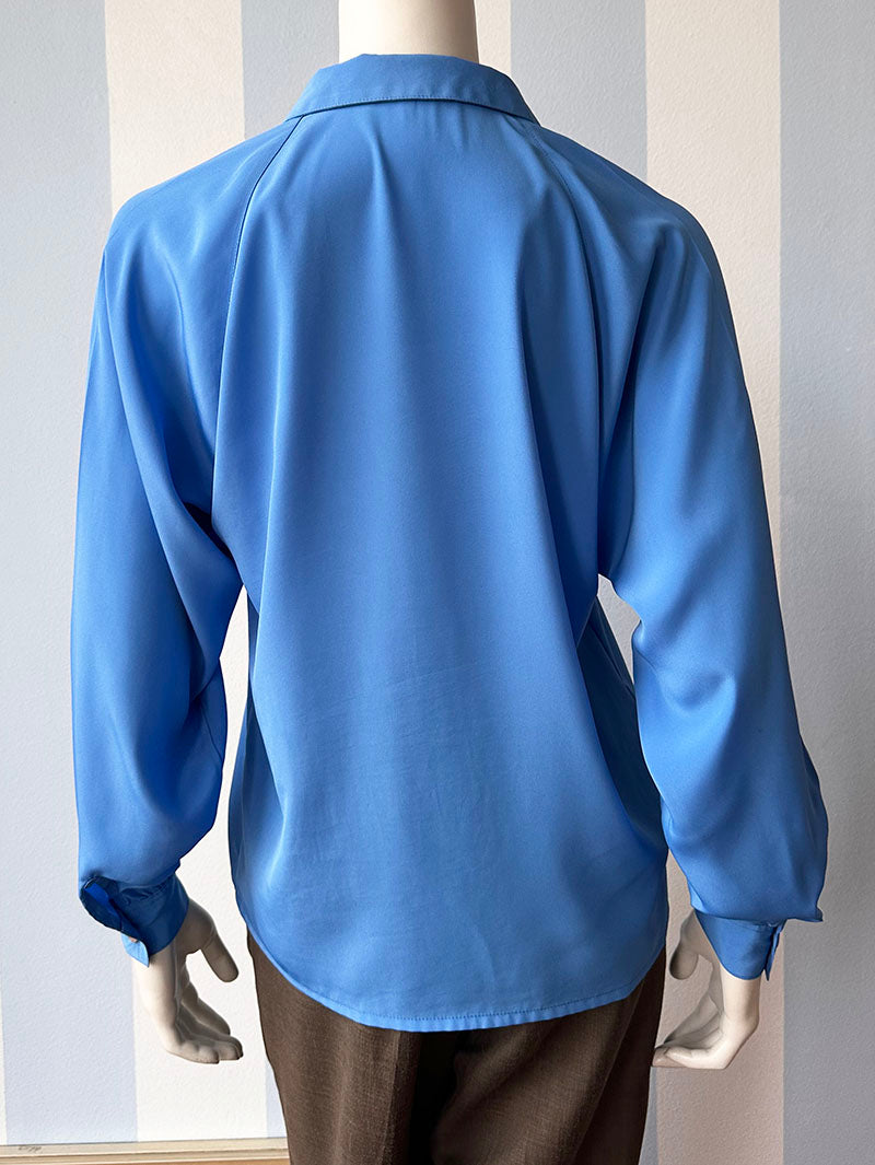 Blauwe vintage blouse
