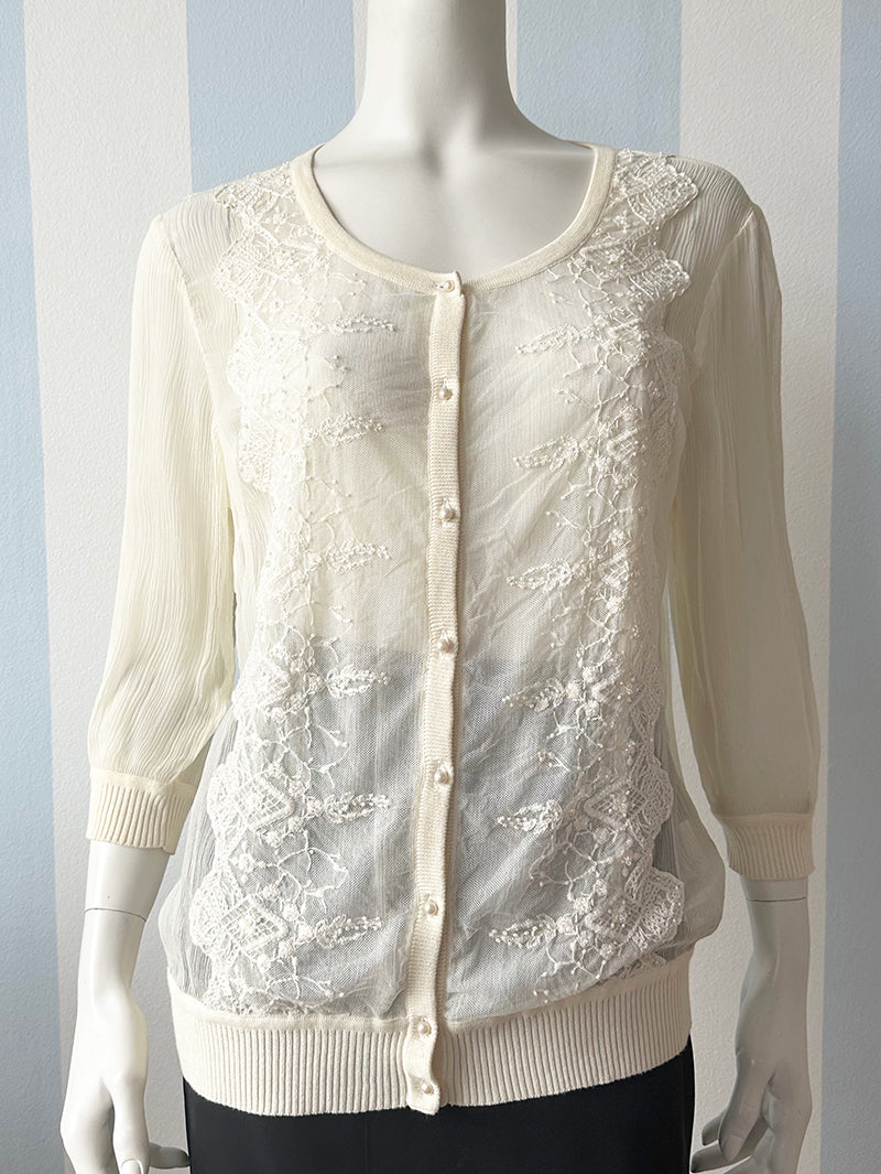 Zijden top met kraaltjes