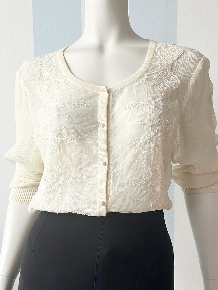 Zijden top met kraaltjes