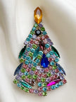 Kristalglazen kerstboombroche met oranje piek