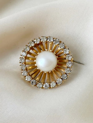 Ronde broche met faux parel en strass