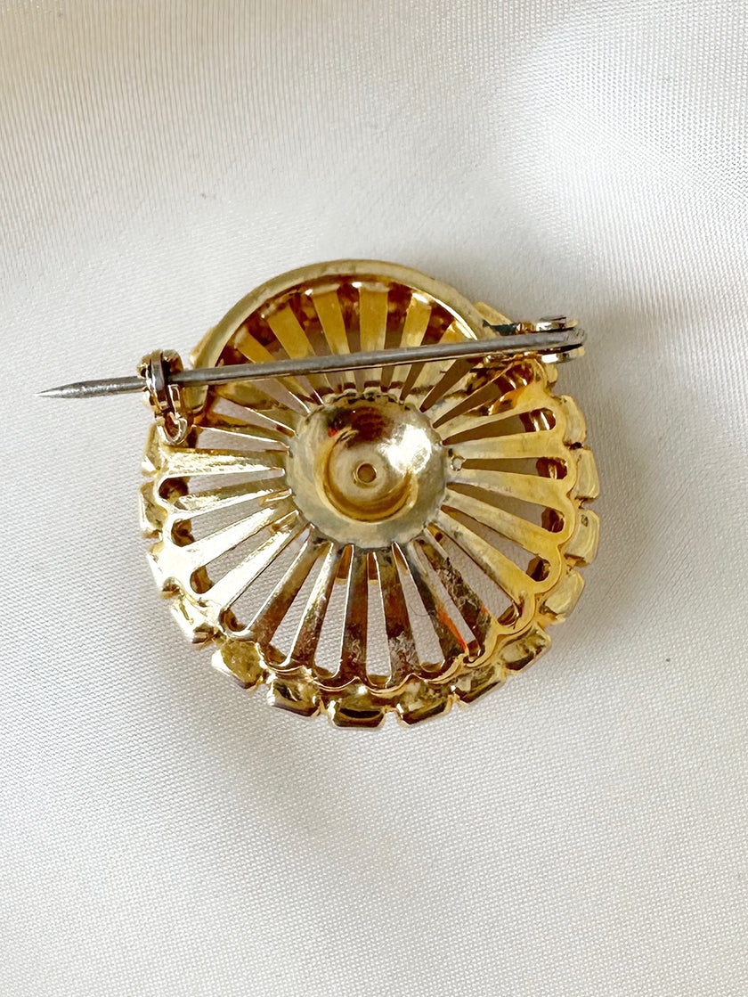 Ronde broche met faux parel en strass