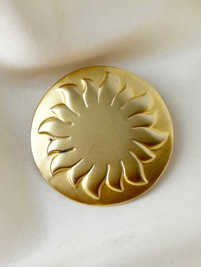 Ronde gouden zon broche