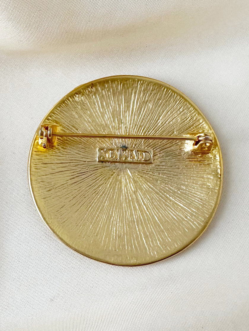 Ronde gouden zon broche