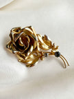 Grote gouden roos broche