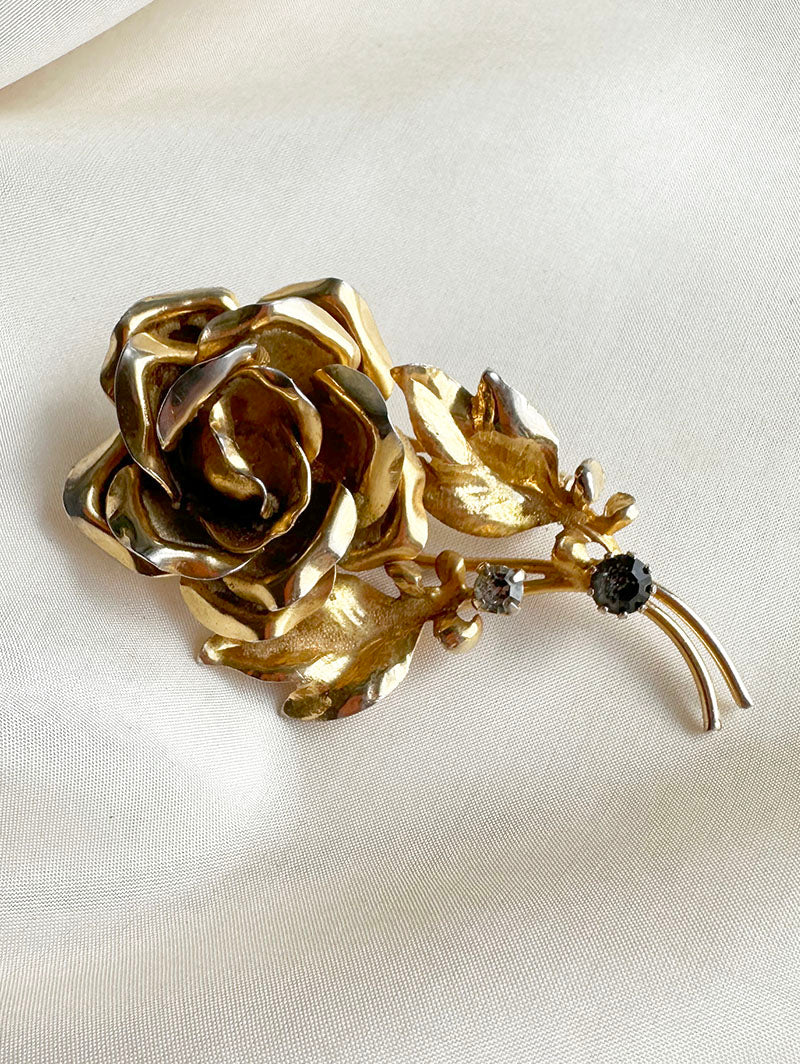 Grote gouden roos broche