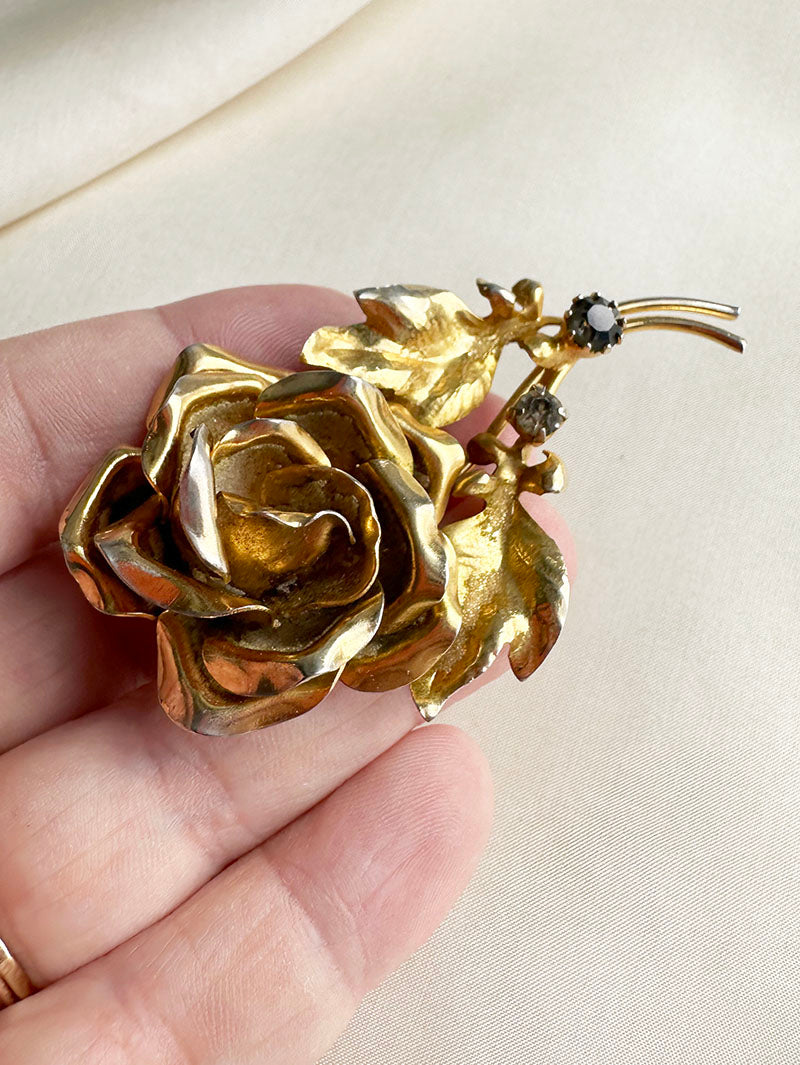 Grote gouden roos broche