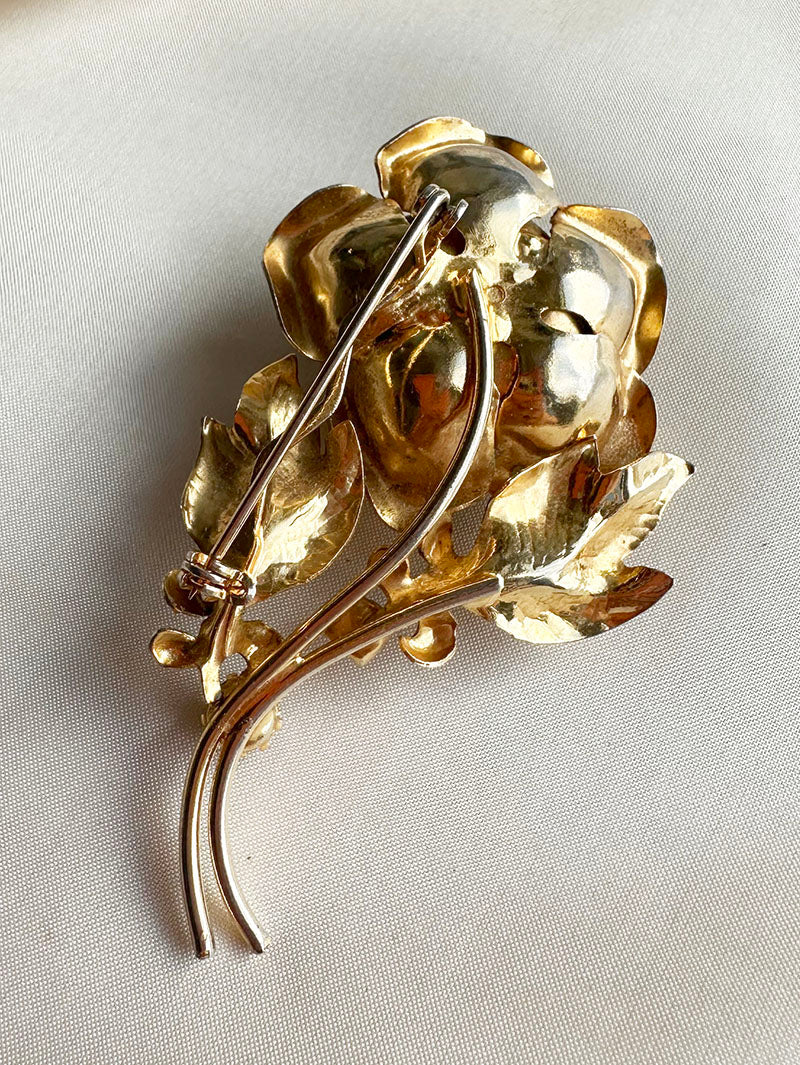 Grote gouden roos broche