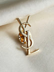 YSL pin broche