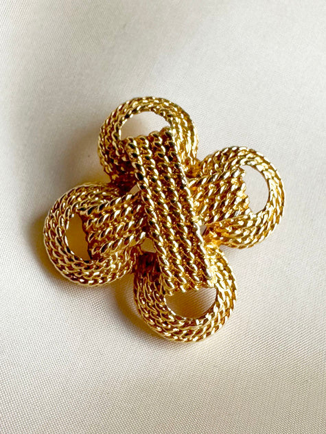 Gouden gevlochten broche