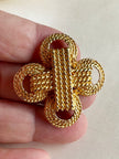 Gouden gevlochten broche
